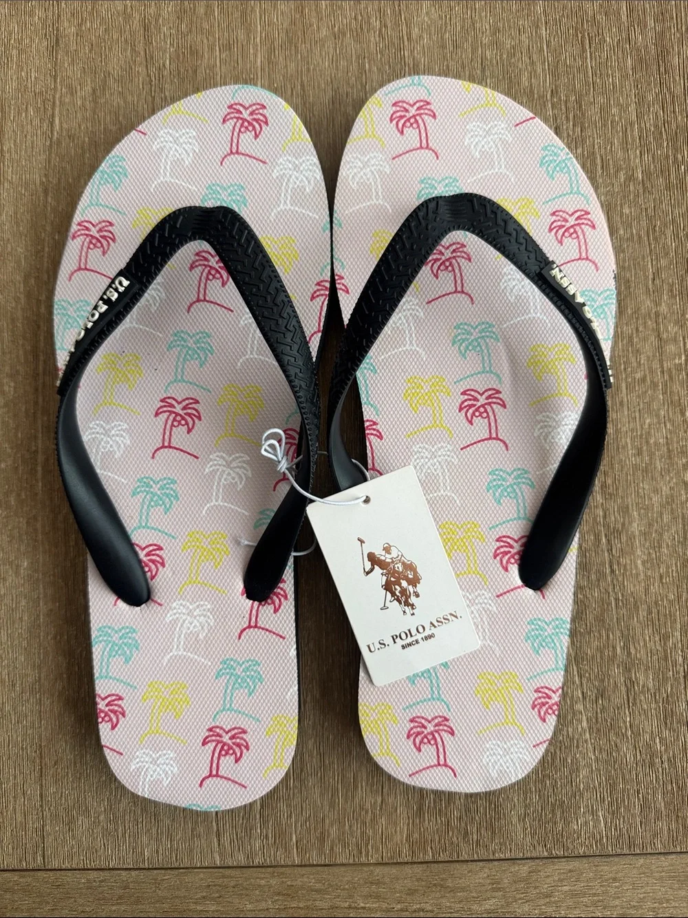 U.S. Polo Assn. Kids Pink Palm-Print Flip Flops with Black Straps